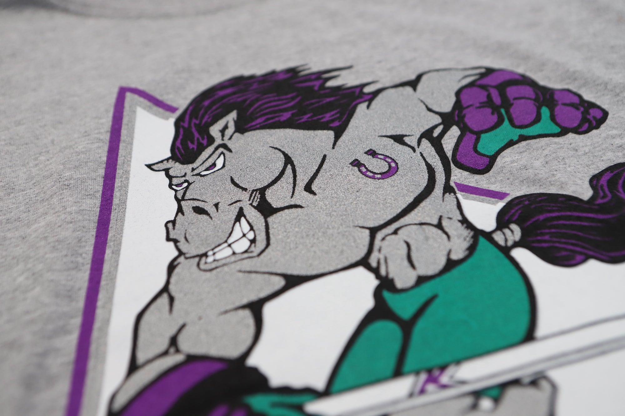 Kentucky Thoroughblades Long Sleeve Shirt with the purple-maned horse skater over teal script on the front, view 2