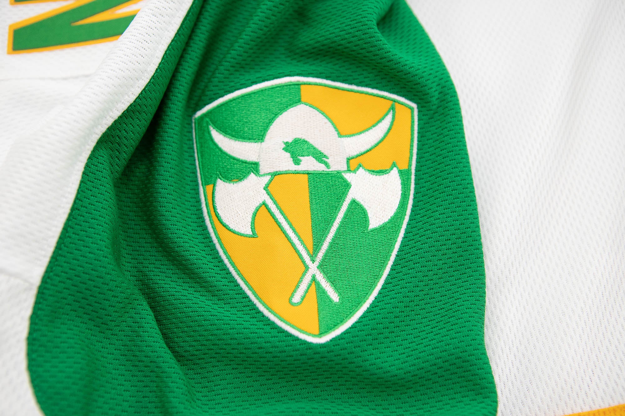 Buffalo Norsemen 1975-76 jersey, shoulder patch close-up with shield with horned helmet and crossed axes
