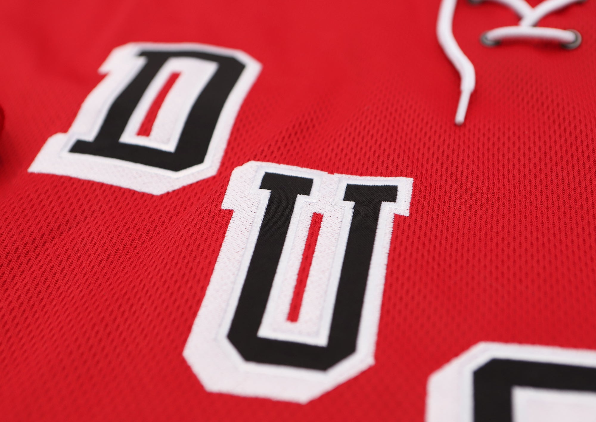 Long Island Ducks 1965-66 Jersey (BLANK - PRE-ORDER) in red mesh with vintage lace-up collar and bold team lettering detail